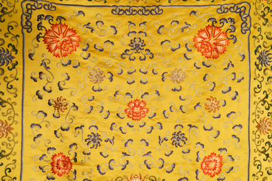 A Chinese yellow-ground silk embroidered altar cloth with floral design, 18/19th C.