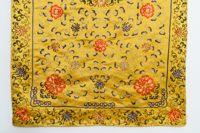 A Chinese yellow-ground silk embroidered altar cloth with floral design, 18/19th C.