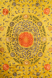 A Chinese yellow-ground silk embroidered altar cloth with floral design, 18/19th C.