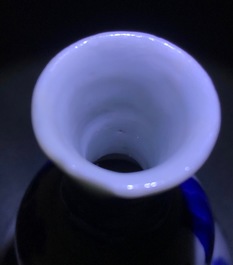 A Chinese blue and white double gourd vase, Transitional period