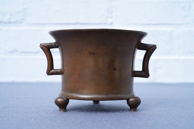 A Chinese bronze tripod censer, Xuande mark, 17/18th C.