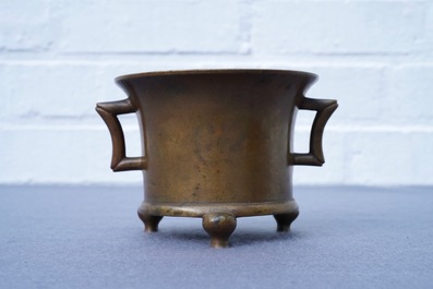 A Chinese bronze tripod censer, Xuande mark, 17/18th C.