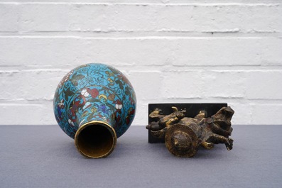 A Chinese cloisonn&eacute; bottle vase and a gilt bronze group, 18/19th C.