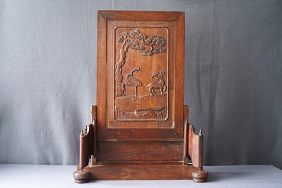 A fine Chinese grisaille 'winter landscape' plaque in a wooden table screen, Republic, 20th C.