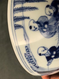 A Chinese blue and white 'playing boys' bowl, Yongzheng mark and of the period