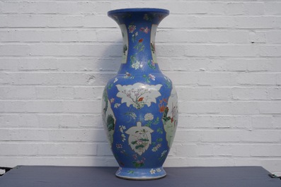 A pair of large Chinese blue-ground famille rose vases with figural design, Qianlong mark, 19th C.