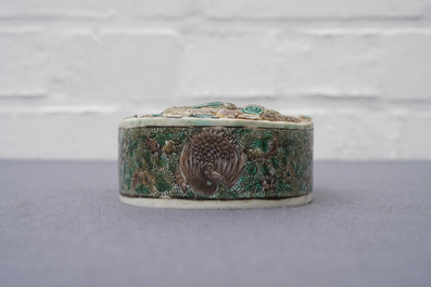 A Chinese verte biscuit 'dragon and cranes' ink stone, Kangxi