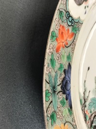 A Chinese famille verte charger with a bird, flowers and butterflies, Kangxi