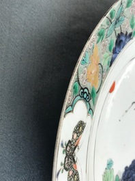 A Chinese famille verte charger with a bird, flowers and butterflies, Kangxi