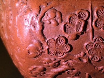 A large Chinese Yixing stoneware teapot with applied design, Kangxi