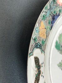 A Chinese famille verte charger with a bird, flowers and butterflies, Kangxi
