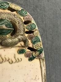 Een Chinese verte biscuit inktsteen met een draak en kraanvogels, Kangxi