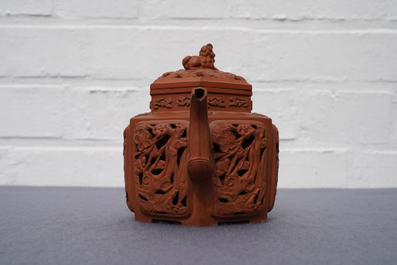 A Chinese Yixing stoneware reticulated teapot and cover, Kangxi