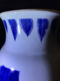 A Chinese blue and white sleeve vase with figural design all-round, Transitional period