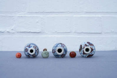 Three Chinese blue, white and underglaze red snuff bottles, Yongzheng marks, 19th C.