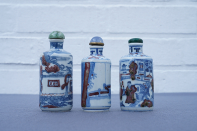 Three Chinese blue, white and underglaze red snuff bottles, Yongzheng marks, 18/19th C.