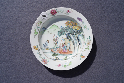 A fine Chinese famille rose 'ruby back' plate with figures and boats, Yongzheng