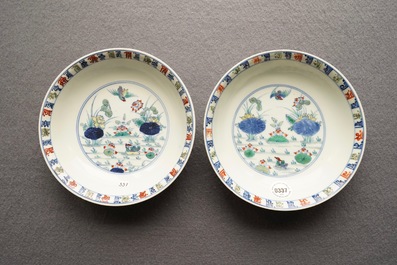 A pair of Chinese doucai 'ducks and lotus pond' plates, Chenghua mark, 18th C.