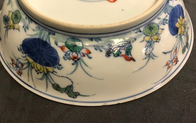 A pair of Chinese doucai 'ducks and lotus pond' plates, Chenghua mark, 18th C.