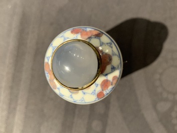 Three Chinese blue, white and underglaze red snuff bottles, Yongzheng marks, 18/19th C.