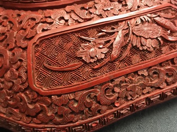 A Chinese cinnabar lacquer box and cover with figures in a landscape, 19th C.