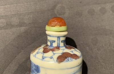 Three Chinese blue, white and underglaze red snuff bottles, Yongzheng marks, 19th C.