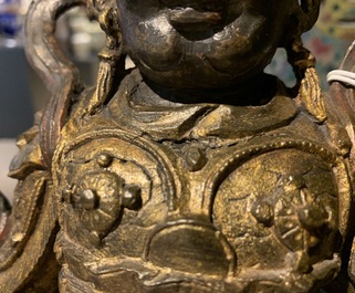 A Chinese gilt-lacquered bronze figure of Weituo, Ming