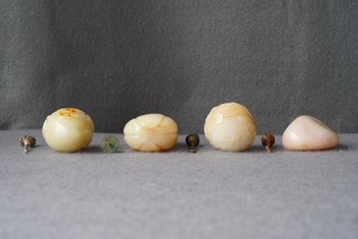 Four Chinese russet jade snuff bottles, 19/20th C.