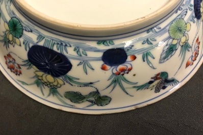 A pair of Chinese doucai 'ducks and lotus pond' plates, Chenghua mark, 18th C.