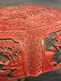 A Chinese cinnabar lacquer box and cover with figures in a landscape, 19th C.