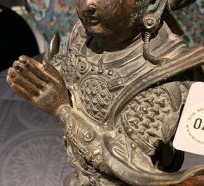 A Chinese gilt-lacquered bronze figure of Weituo, Ming