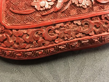 A Chinese cinnabar lacquer box and cover with figures in a landscape, 19th C.