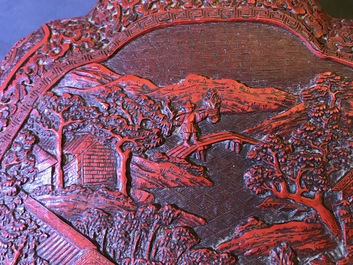 A Chinese cinnabar lacquer box and cover with figures in a landscape, 19th C.