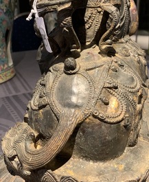 A large Chinese bronze group of Guanyin on a dragon, prob. Ming