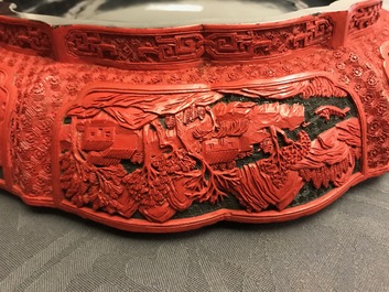 A Chinese cinnabar lacquer box and cover with figures in a landscape, 19th C.