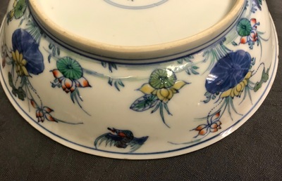 A pair of Chinese doucai 'ducks and lotus pond' plates, Chenghua mark, 18th C.