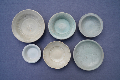 A collection of 15 Chinese celadon- and cream-glazed wares, Song and later