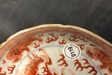 A Chinese blue, white and iron red 'Buddhist lion' plate, Qianlong mark, 18/19th C.