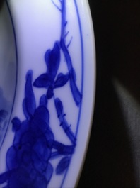 Een Chinees blauw-wit 'Master of the rocks' bord, Kangxi