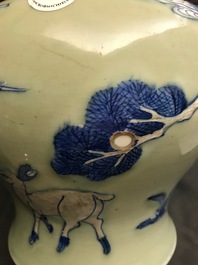 A Chinese underglaze red, blue and white celadon-ground vase, Kangxi