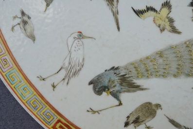 A round Chinese famille rose 'birds' plaque, 19th C.