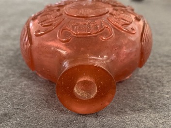 Four Chinese cherry red and pink glass snuff bottles, 19/20th C.