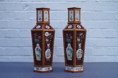 Une paire de vases &agrave; double parois en porcelaine de Chine famille rose, Yongzheng