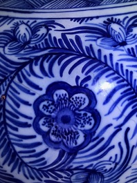 A pair of large Dutch Delft blue and white vases and covers, 18th C.