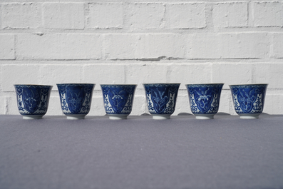 Twelve Chinese blue and white cups and saucers, 19th C.