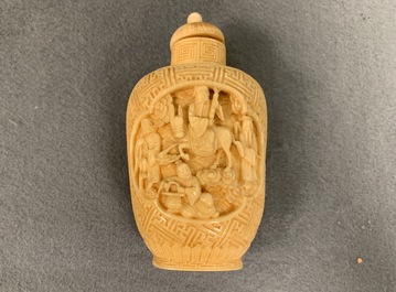 Two Chinese carved ivory snuff bottles, 19th C.