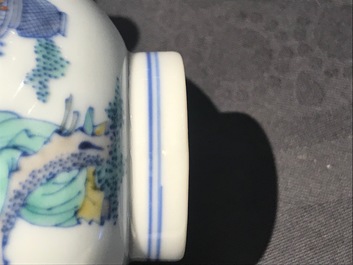 A Chinese doucai bowl with figures in a landscape, Kangxi mark, 19/20th C.