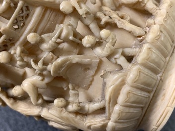 Two Chinese carved ivory snuff bottles, 19th C.