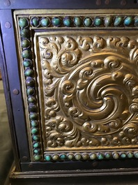 A turquoise-inlaid gilt bronze and copper repouss&eacute; 'tepchog' folding altar table, Tibet, 19th C.