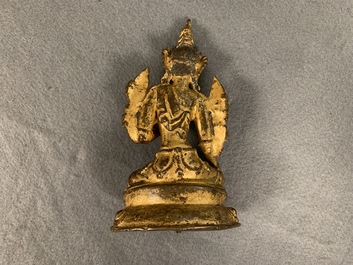 A Sino-Tibetan gilt bronze figure of Green Tara, 17/18th C.